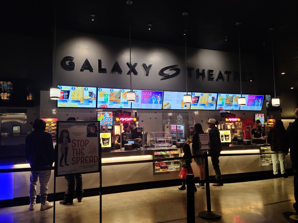 Concession stand and lobby signage inside Galaxy Theatres Austin