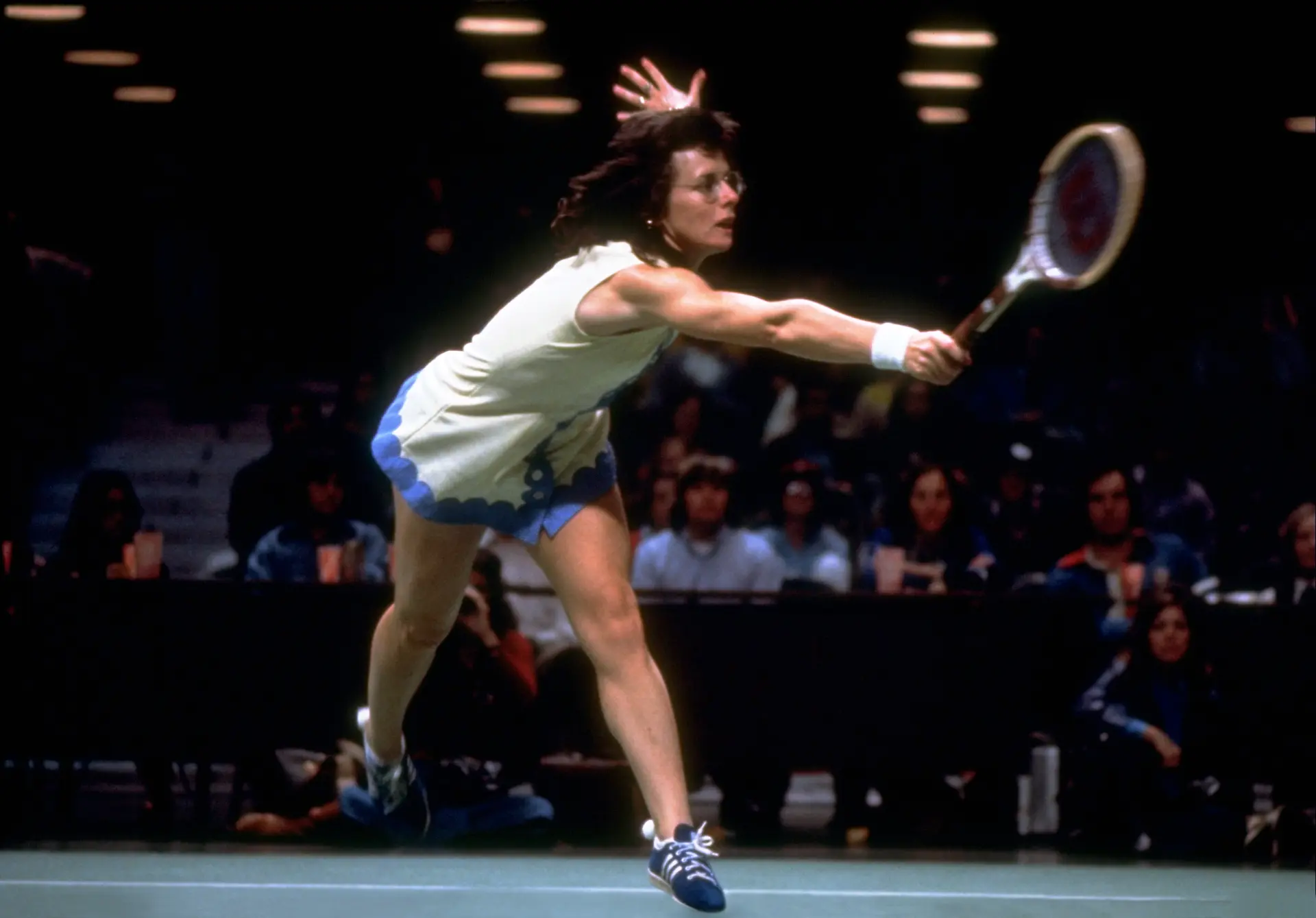 Billie Jean King stretching for a backhand during a match, from Give Me The Ball! (credit: Ellen Griesedieck)
